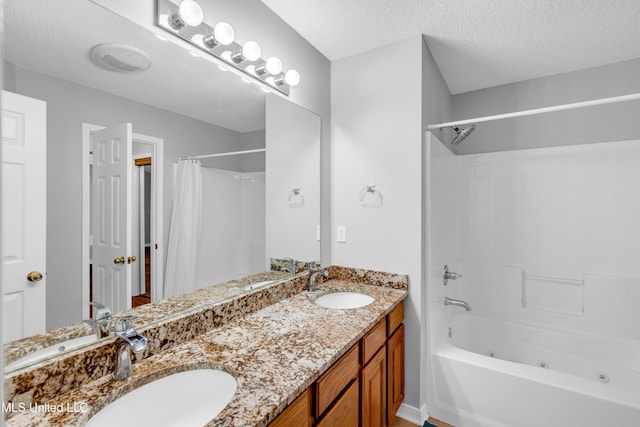 20 Lakeview Dr, Ocean Springs, MS 39564 - full bath with a combined bath / shower with jetted tub, double vanity, and a textured ceiling