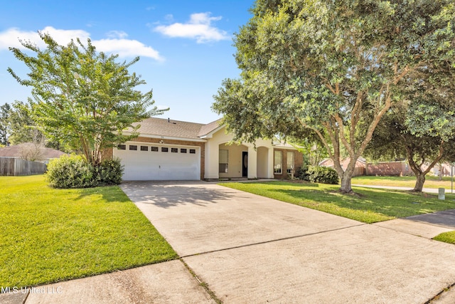 20 Lakeview Dr, Ocean Springs, MS 39564 - view of front of property with a garage, concrete driveway, and stucco siding
