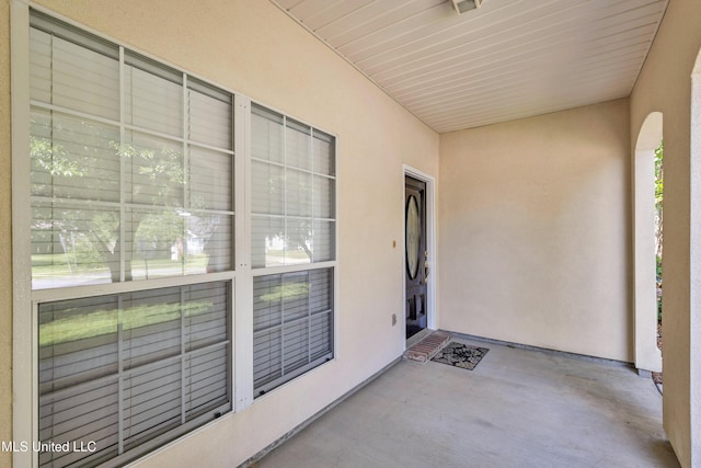 20 Lakeview Dr, Ocean Springs, MS 39564 - view of exterior entry with stucco siding and a patio