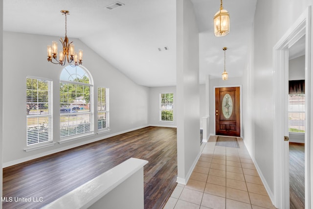 20 Lakeview Dr, Ocean Springs, MS 39564 - foyer with a chandelier, lofted ceiling, and light wood-type flooring