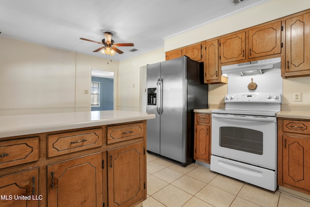 kitchen with white electric range, stainless steel fridge, ceiling fan, and light tile patterned floors