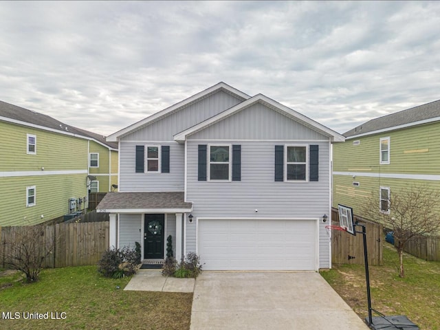 view of front of house with a garage and a front yard