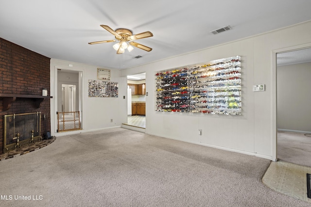 2900 7th Ave, Gulfport, MS 39501 - unfurnished living room with carpet, ceiling fan, baseboards, and a fireplace