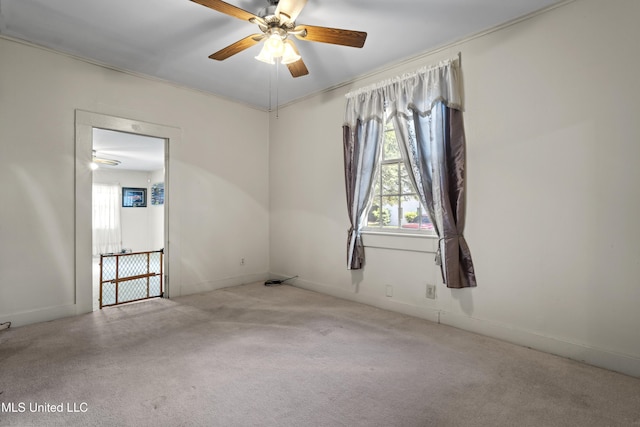 2900 7th Ave, Gulfport, MS 39501 - spare room featuring healthy amount of natural light, ceiling fan, and carpet