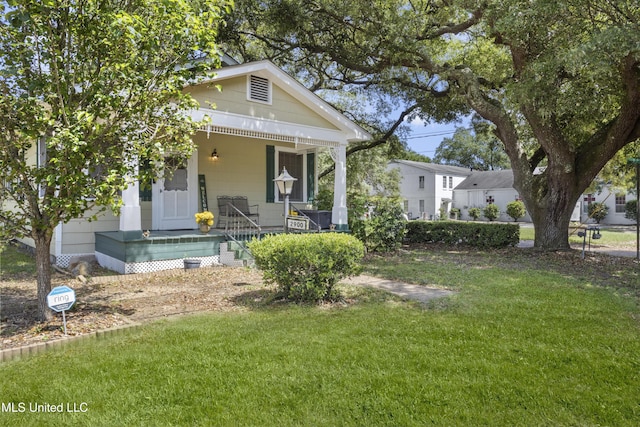 2900 7th Ave, Gulfport, MS 39501 - view of front of house featuring covered porch and a front yard