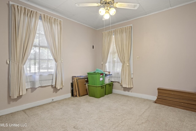 2900 7th Ave, Gulfport, MS 39501 - carpeted spare room with a ceiling fan, baseboards, and ornamental molding