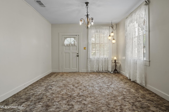 2900 7th Ave, Gulfport, MS 39501 - entrance foyer with a chandelier, carpet flooring, ornamental molding, and baseboards