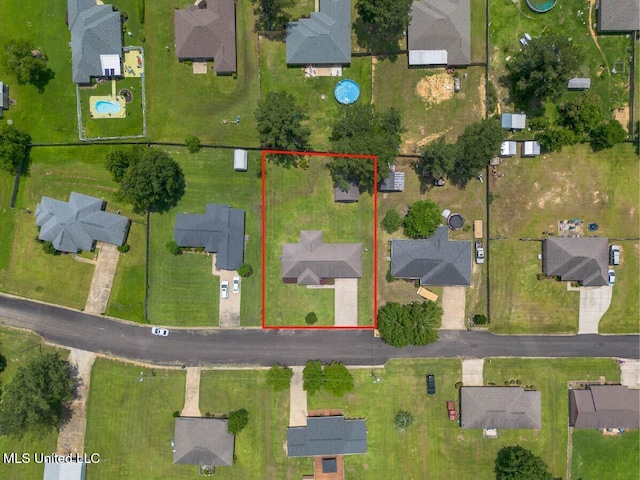 1104 SE 2nd St, Magee, MS 39111 - aerial perspective of suburban area featuring property boundaries highlighted
