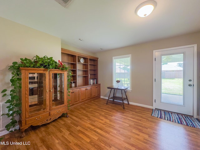 1104 SE 2nd St, Magee, MS 39111 - entryway with light wood-style flooring and baseboards