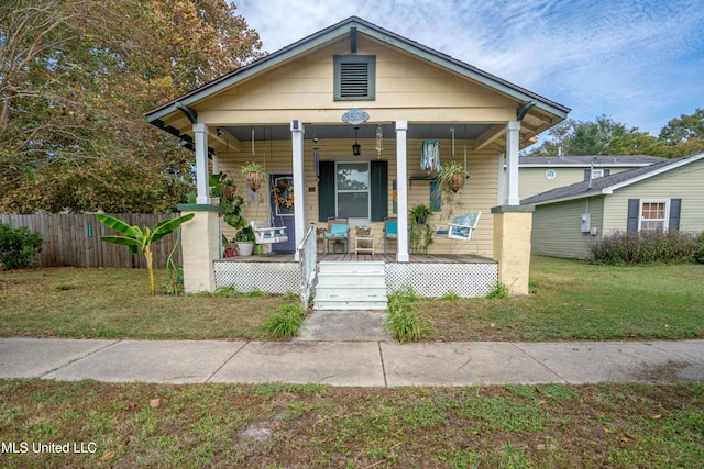 3508 11th St, Gulfport, MS 39501 - shotgun-style home with a porch