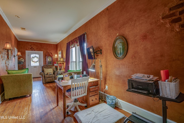 living room with hardwood / wood-style flooring and ornamental molding