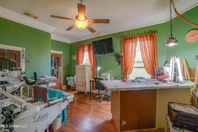 3508 11th St, Gulfport, MS 39501 - home office featuring a ceiling fan, crown molding, and hardwood / wood-style flooring