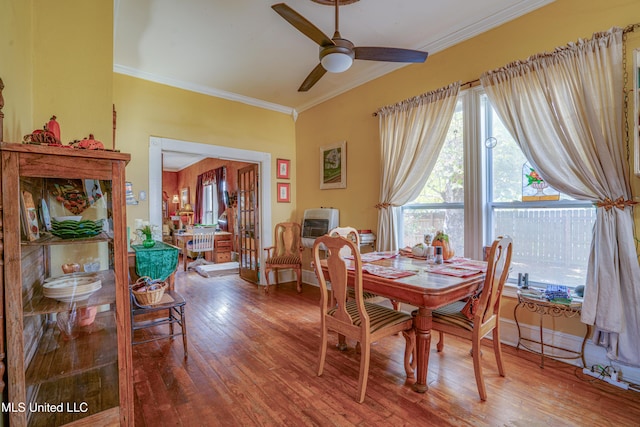 3508 11th St, Gulfport, MS 39501 - dining space featuring crown molding, wood finished floors, and a ceiling fan