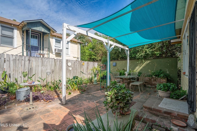 3508 11th St, Gulfport, MS 39501 - fenced backyard with outdoor dining space, a patio area, and cooling unit