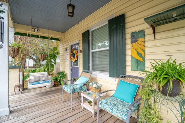 deck featuring a porch