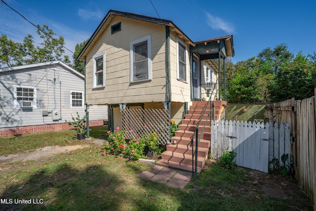3508 11th St, Gulfport, MS 39501 - back of house with stairs and a gate