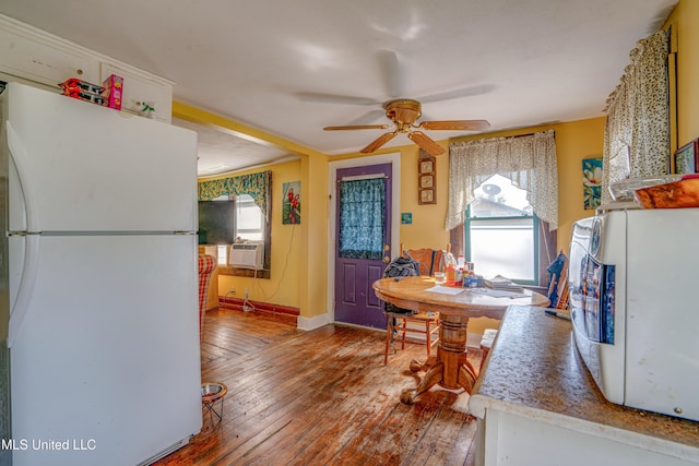 3508 11th St, Gulfport, MS 39501 - kitchen with freestanding refrigerator, hardwood / wood-style floors, a ceiling fan, baseboards, and cooling unit