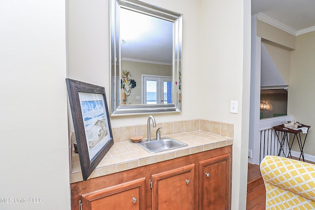 65 Breakers Ln, Ridgeland, MS 39157 - bar area featuring a sink and crown molding