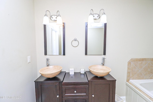 65 Breakers Ln, Ridgeland, MS 39157 - full bathroom featuring double vanity and a garden tub