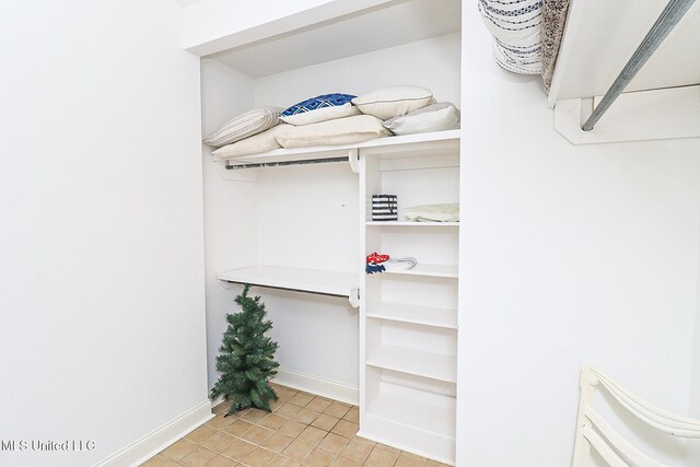 65 Breakers Ln, Ridgeland, MS 39157 - walk in closet featuring light tile patterned floors