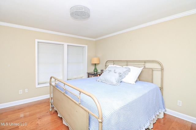 65 Breakers Ln, Ridgeland, MS 39157 - bedroom featuring wood finished floors, ornamental molding, and baseboards