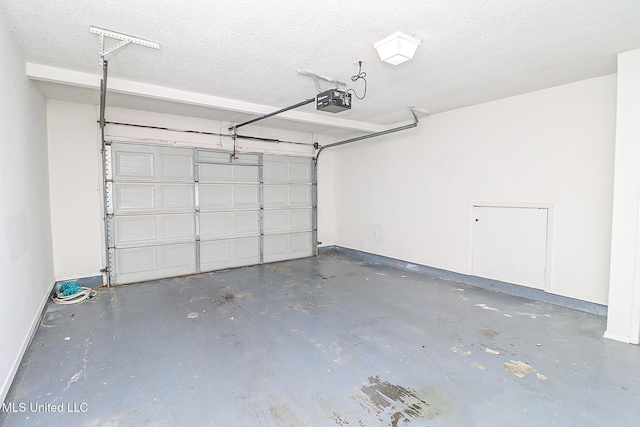 65 Breakers Ln, Ridgeland, MS 39157 - garage with a garage door opener and baseboards