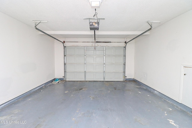 65 Breakers Ln, Ridgeland, MS 39157 - garage with a garage door opener and baseboards