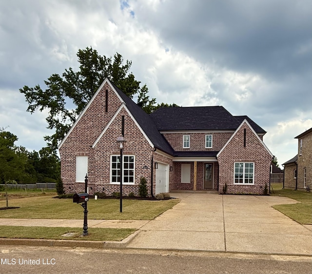 4277 S Bolivar Trl, Olive Branch, MS 38654 - traditional home featuring driveway, brick siding, and an attached garage