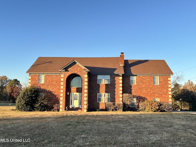 view of front of house with a front yard