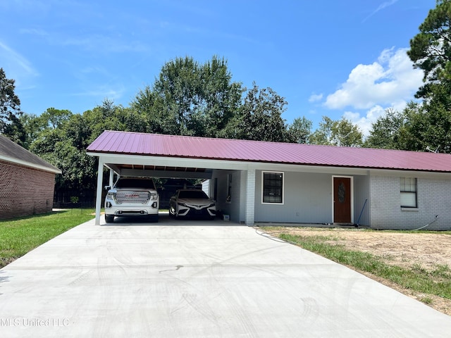 view of front of house featuring a carport