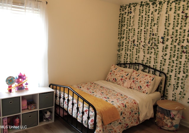 6904 Braybourne Main, Olive Branch, MS 38654 - bedroom featuring wood finished floors