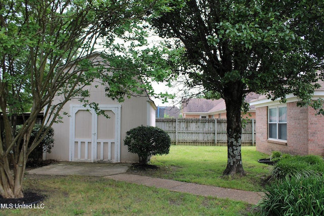 6904 Braybourne Main, Olive Branch, MS 38654 - view of yard with an outbuilding and a shed