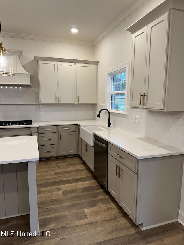 kitchen with stainless steel dishwasher, gray cabinets, premium range hood, ornamental molding, and black cooktop