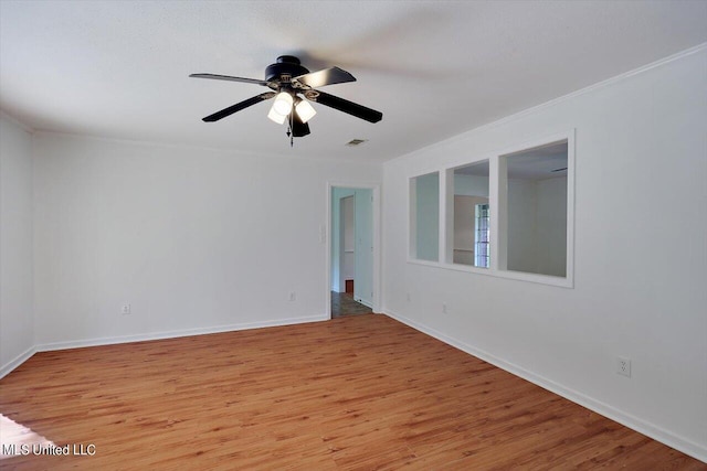 603 Herndon Hl, Clinton, MS 39056 - empty room with light wood finished floors, a ceiling fan, and baseboards