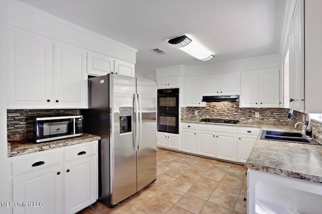 603 Herndon Hl, Clinton, MS 39056 - kitchen featuring stainless steel appliances, a sink, tasteful backsplash, and ventilation hood