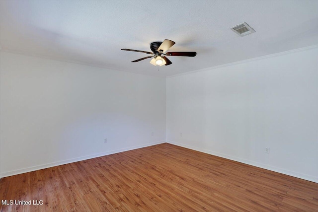 603 Herndon Hl, Clinton, MS 39056 - unfurnished room featuring ceiling fan, wood finished floors, baseboards, and ornamental molding