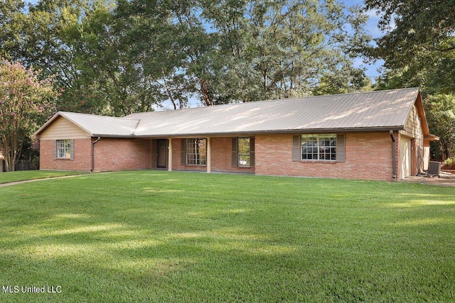 603 Herndon Hl, Clinton, MS 39056 - ranch-style house with a front yard, a garage, brick siding, and metal roof