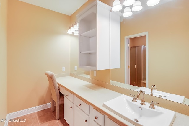 bathroom featuring vanity, an enclosed shower, and tile patterned floors