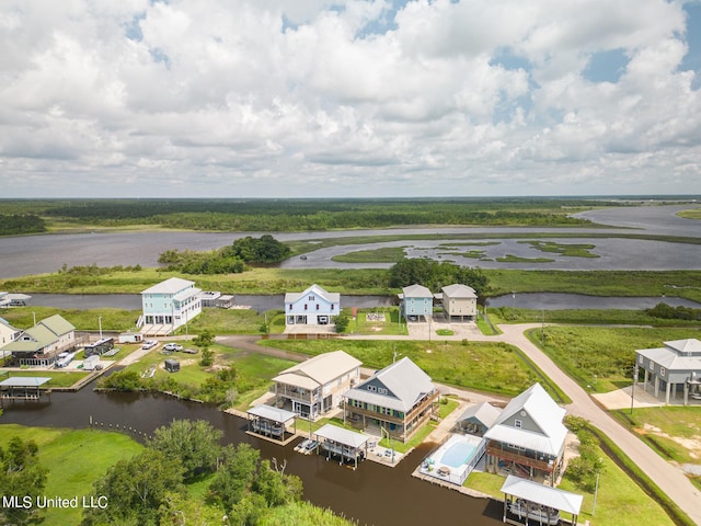 drone / aerial view featuring a water view