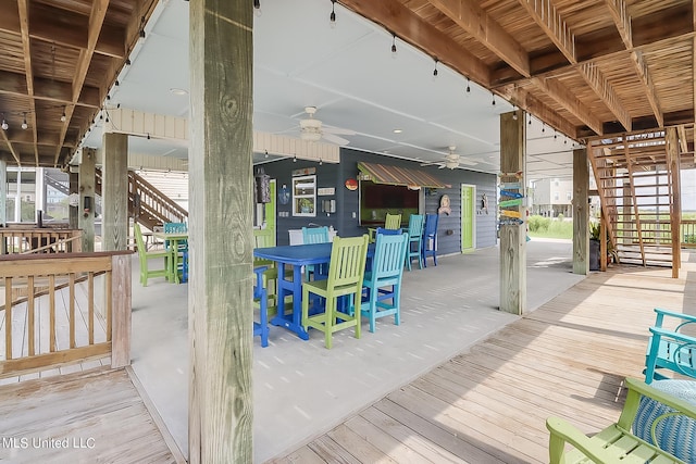 wooden deck with ceiling fan