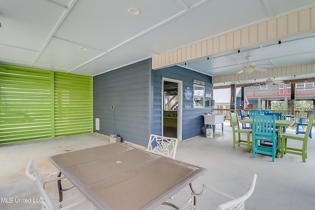 view of patio / terrace featuring sink and ceiling fan