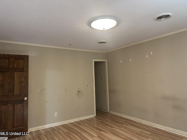 25 Oak Creek Pl, Jackson, MS 39211 - unfurnished room with light wood finished floors and ornamental molding