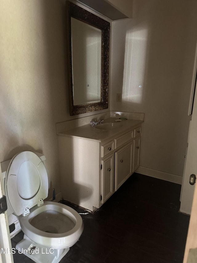 25 Oak Creek Pl, Jackson, MS 39211 - half bath featuring vanity and wood finished floors