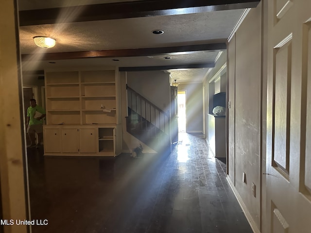 25 Oak Creek Pl, Jackson, MS 39211 - hallway featuring a textured ceiling, stairs, and wood finished floors
