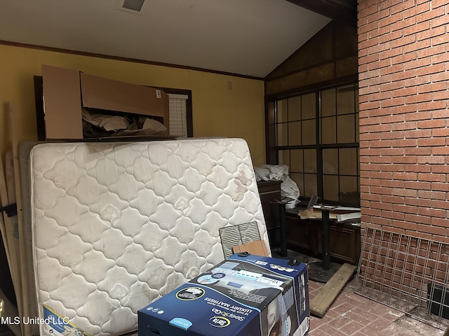 25 Oak Creek Pl, Jackson, MS 39211 - bedroom with brick patterned floors, lofted ceiling, and crown molding