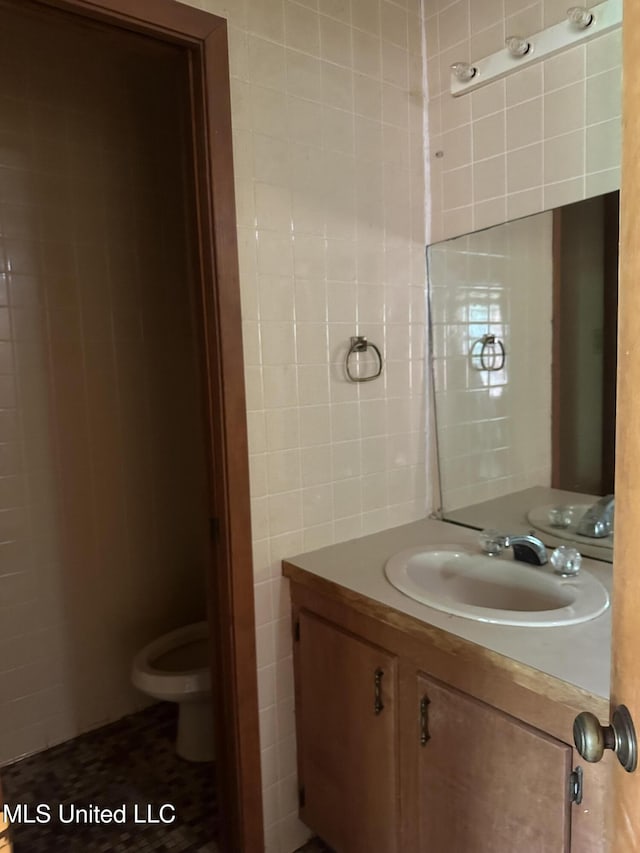 25 Oak Creek Pl, Jackson, MS 39211 - bathroom featuring vanity and tile walls