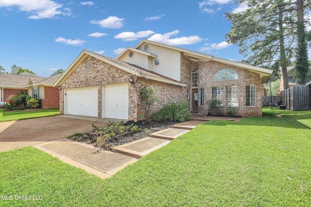 view of front property featuring a front yard and a garage