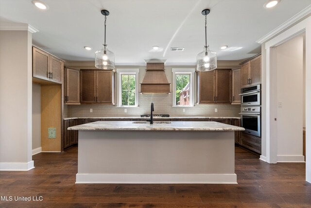 8025 Old Addison Dr, Olive Branch, MS 38654 - kitchen featuring custom exhaust hood, a sink, backsplash, recessed lighting, and baseboards