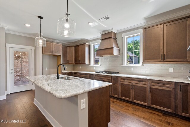 8025 Old Addison Dr, Olive Branch, MS 38654 - kitchen with a sink, premium range hood, stainless steel gas cooktop, crown molding, and dark wood finished floors