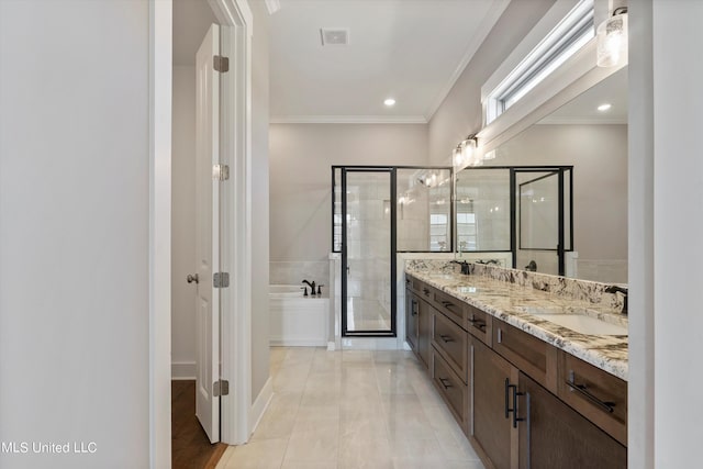 8025 Old Addison Dr, Olive Branch, MS 38654 - full bathroom featuring crown molding, double vanity, a bath, a shower with shower door, and recessed lighting